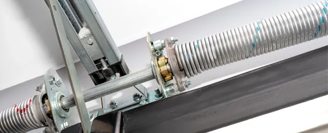 Cómo reparar los muelles de torsión de tu puerta de garaje