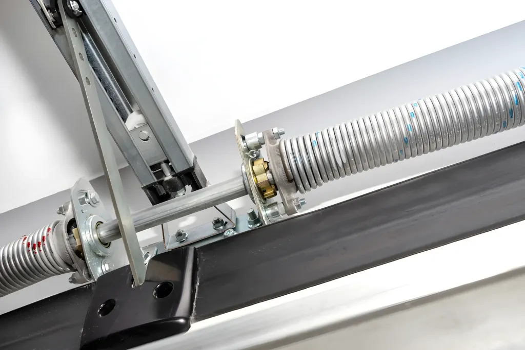 Sustitución de muelles de torsión en puertas seccionales